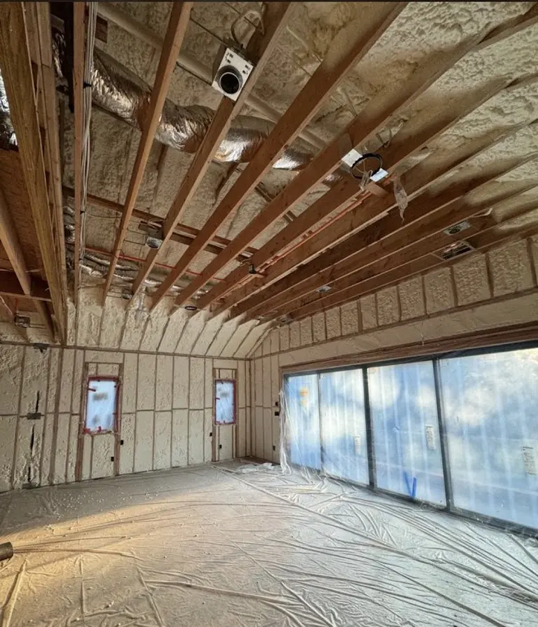 Interior walls and ceiling insulated with spray foam during new construction in Paradise Valley